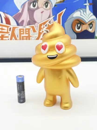 Unchi-Kun [gold] Sofubi 6" squeaky doll | Poop man soft vinyl Mr Caca