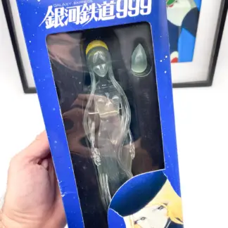 Taito Crystal Claire box held in hand, showing the transparent figure